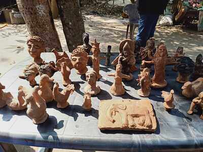 Jhargram's Khwabgaon reels under road misery yet sells crafts in bulk