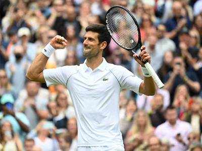 Djokovic into Wimbledon last 32 despite more falls