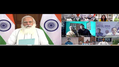 PM Narendra Modi interacts with beneficiaries of Digital India programme