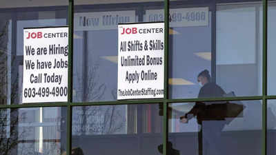 US weekly jobless claims fall; layoffs hit 21-year low in June