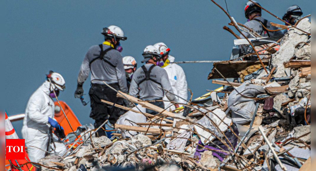 As condo crashed down, they escaped through smoke and ruin