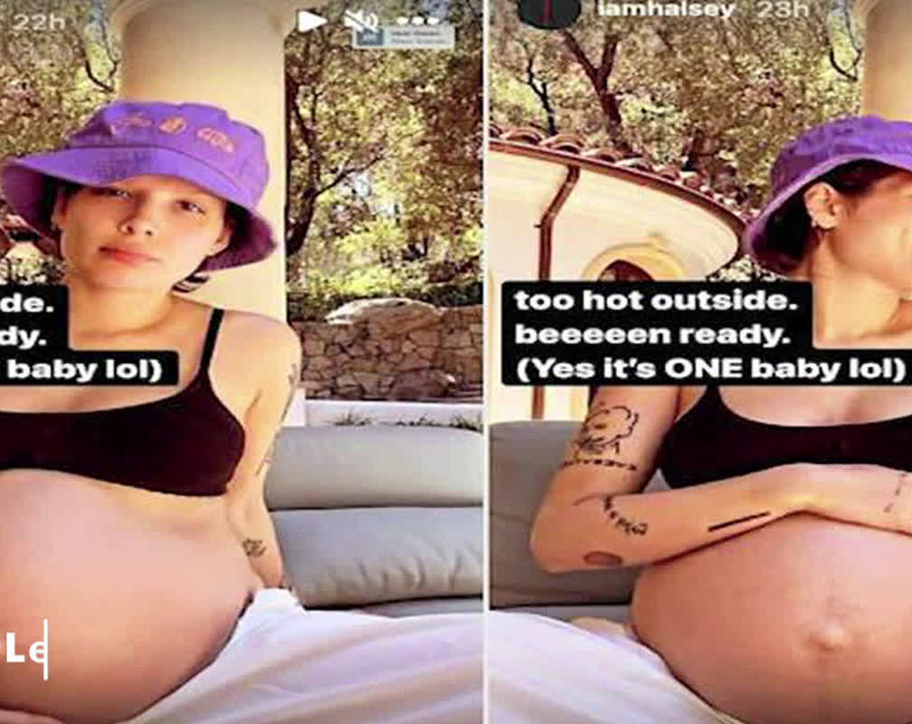 
Halsey flaunts her growing baby bump as she gets ready to welcome first child
