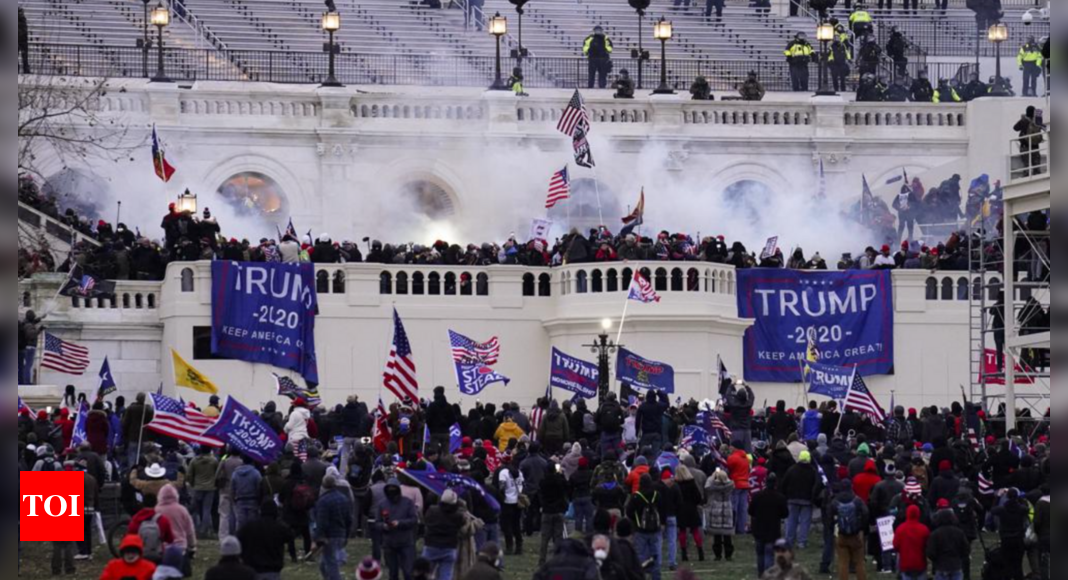 florida-group-charged-with-attack-on-police-during-us-capitol-riot-times-of-india