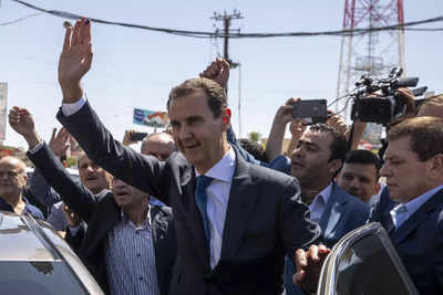 Syria's president decrees 50% salary hike amid harsh crisis