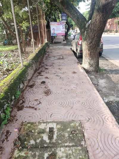 hoardings blocking the footpath - Times of India