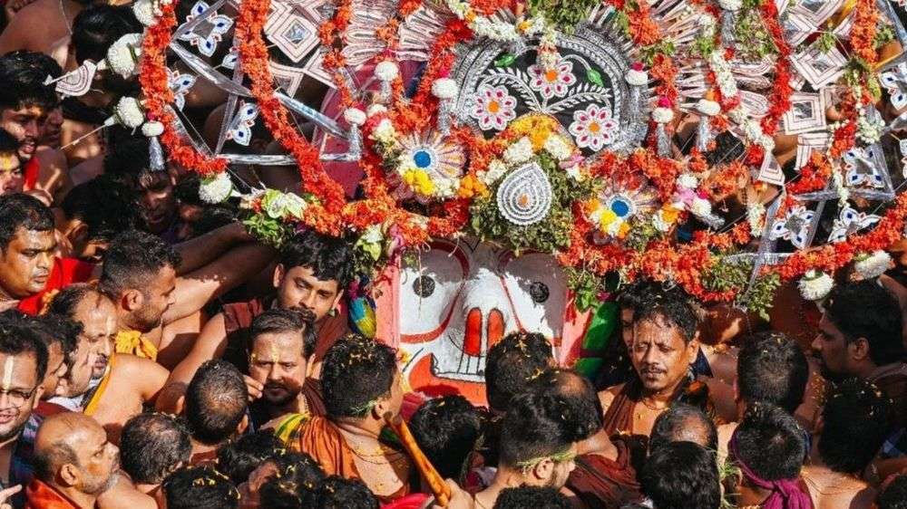 God Balabhadra being taken to chariot