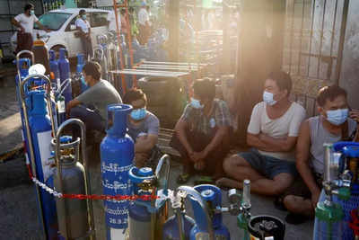 Desperate search for oxygen in Myanmar as latest Covid wave hits
