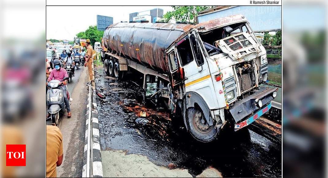 TN: Oil on road cleaned with foam to avoid accidents