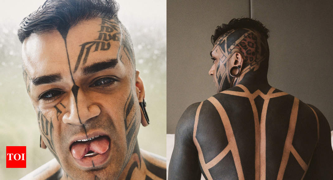 Nationaltattooday: Meet Tattoographer Karan- The Indian who is world's  first fully modified athlete - Times of India