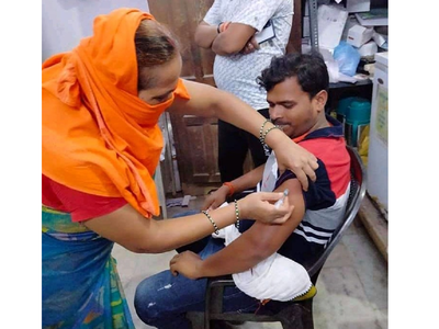Pramod Premi Yadav gets first dose of COVID-19 vaccine