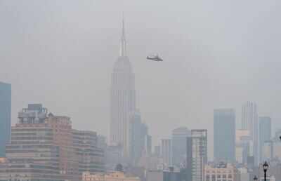 The New York City skyline is seen through a cover of wildfire smoke from Hoboken, New Jersey (Reuters)