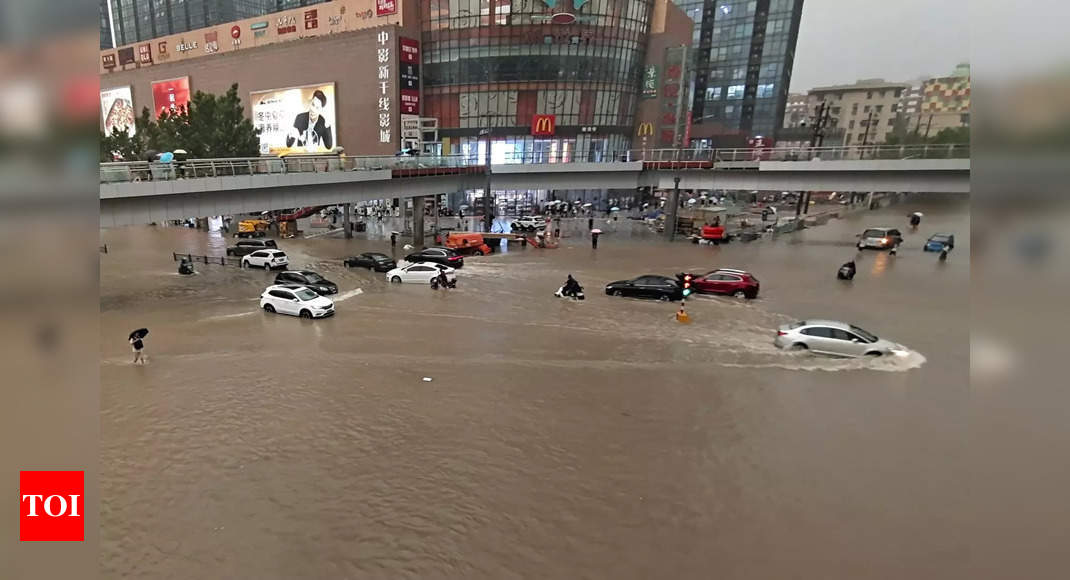 Grim scenes in China as flood inundates a subway