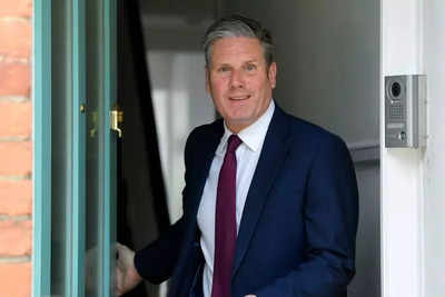 UK opposition Labour leader Keir Starmer in isolation after child tests Covid positive