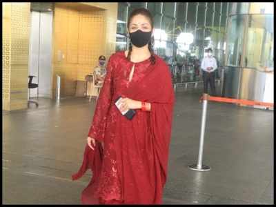 Newlywed Yami Gautam stuns in red as she makes a stylish appearance at the airport