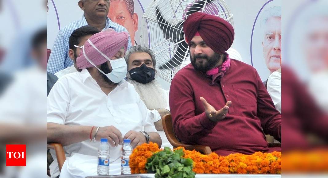 Under-surface tension visible as Sidhu, Capt share stage