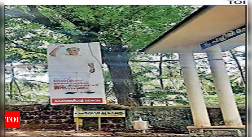 Flex board describing Vijayan as God of Kerala sparks row