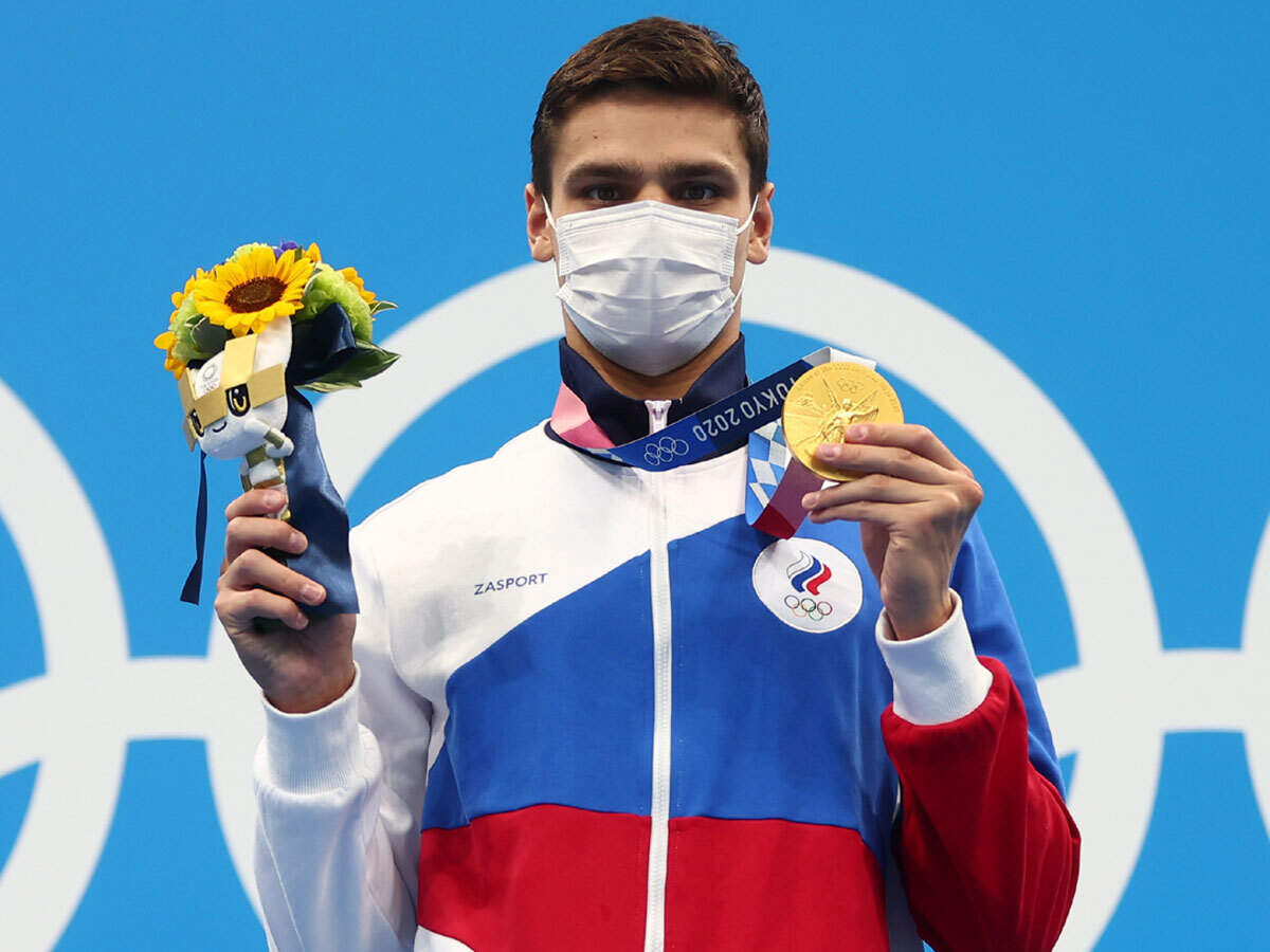Tokyo Olympics 2020: Evgeny Rylov wins gold in men's 100m backstroke to end American streak | Tokyo Olympics News - Times of India