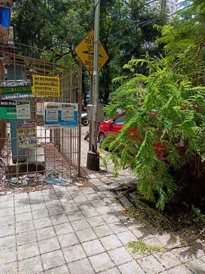 foothpath is blocked by cage like MTNL structure