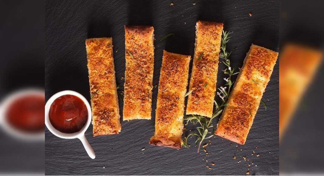 Garlic Breadsticks Recipe: How to Make Garlic Breadsticks Recipe | Homemade Garlic Breadsticks Recip