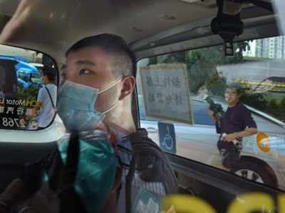 Hong Kong protester given 9-year term in 1st security case