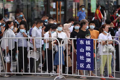 Two more parts of China report Covid outbreaks