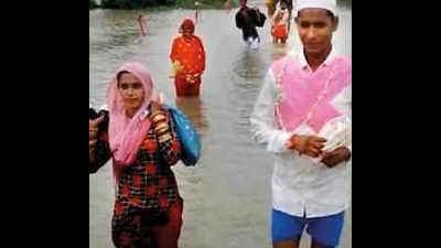 Groom takes off clothes, wades through flood water in Kanpur's Farrukhabad district