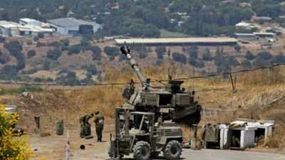 Israeli army says it fires back after 3 rockets from Lebanon