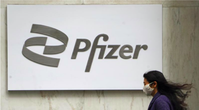 Pfizer to require US workers receive Covid-19 vaccine or regular tests