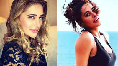Nargis Fakhri reveals she lost jobs in Bollywood because she didn't 'pose  naked' or 'sleep with a director' | Hindi Movie News - Times of India