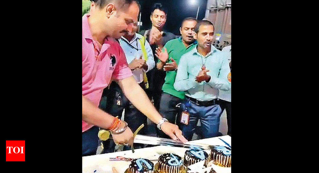 Toll plaza manager held for cutting cake with sword