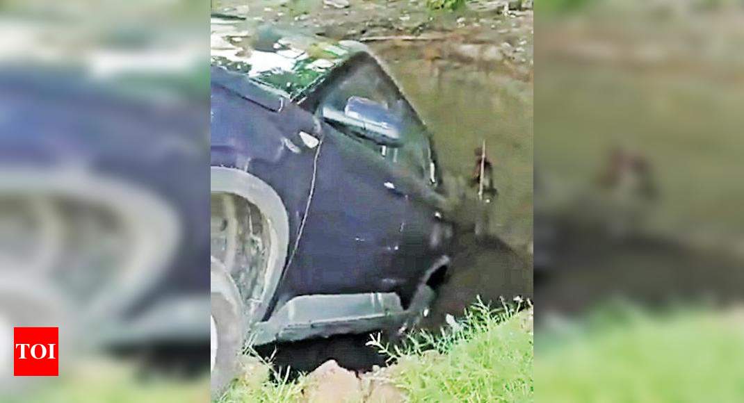 Driver Pulled Out After Car Falls Into Ditch In Police Commissionerate Noida News Times Of India