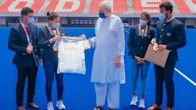 Odisha CM Naveen Patnaik hands over cash award of 2.5 crore &amp; DSP jobs to  hockey players Lakra &amp; Rohidas | Bhubaneswar News - Times of India