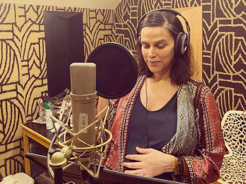 Mom-to-be Neha Dhupia dubs for the next project in her third trimester: Somewhere between backache and burps