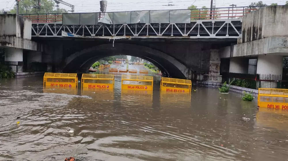 Photos: Traffic crawls on waterlogged Delhi roads