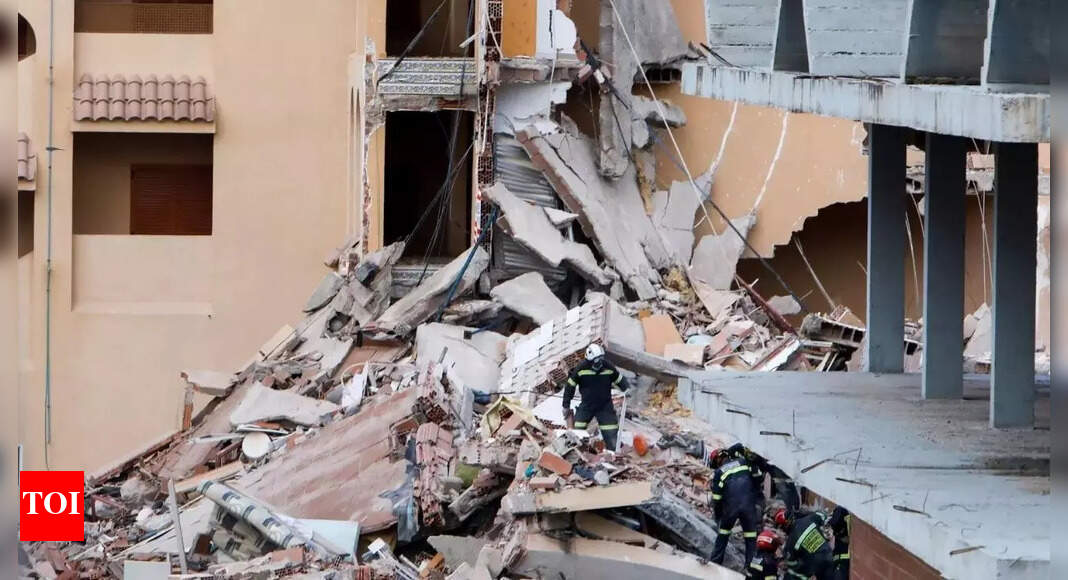 Spanish rescuers pull body from collapsed building, one still missing ...