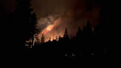 Wildfire menaces California's Lake Tahoe area after chasing away thousands