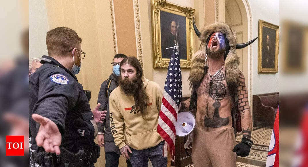 Capitol rioter 'QAnon Shaman' pleads guilty, disappointed Trump didn't pardon