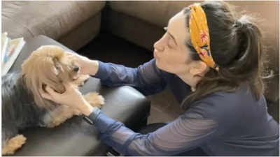 Karisma Kapoor gives a glimpse of her Sunday morning with her furry pal