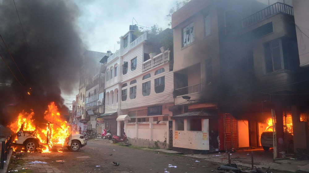 Photos from Agartala: CPM offices vandalised, vehicles set on fire