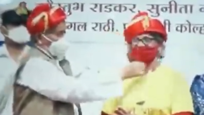 Maharashtra governor BS Koshyari pulls down woman cyclist's mask at function in Pune