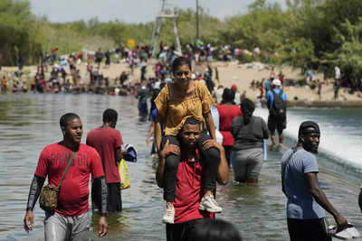 US begins flying Haitian migrants home from Texas