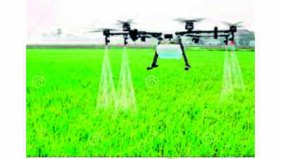 UAS experiments using drones to sprinkle chemicals on crops