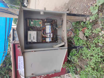 Electricity box open in rainy season
