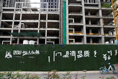 Alarmed by Evergrande, China's lenders hold back on new credit for property developers