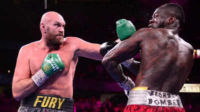 Tyson Fury knocks out Deontay Wilder to retain WBC crown in heavyweight classic