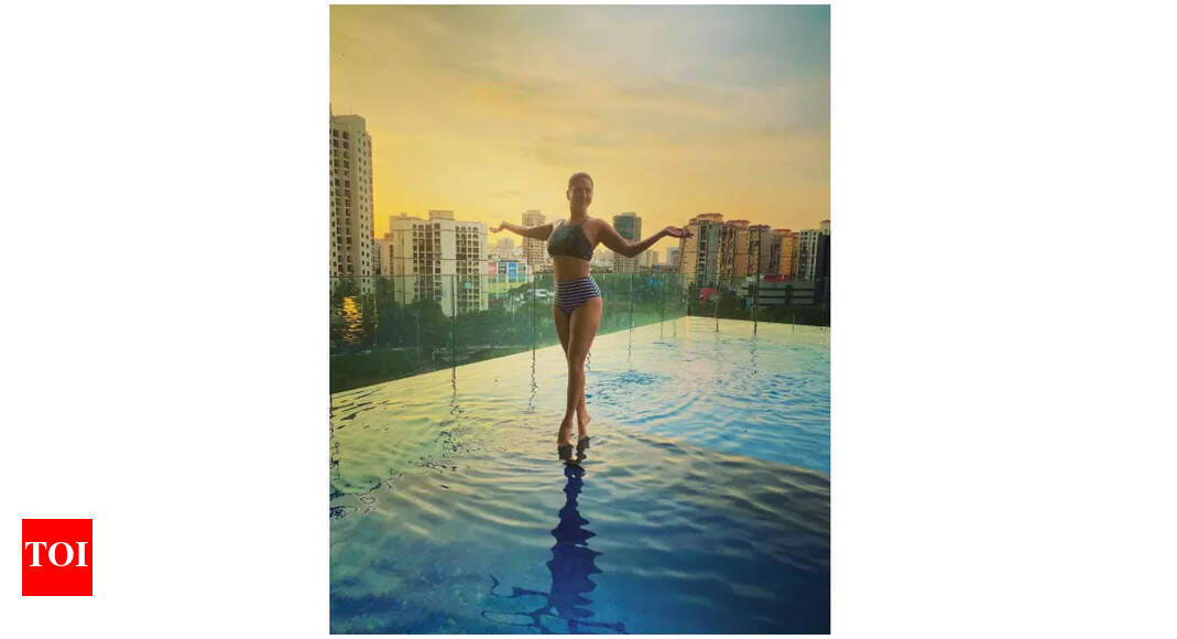 Sunny Leone takes a dip in her terrace pool