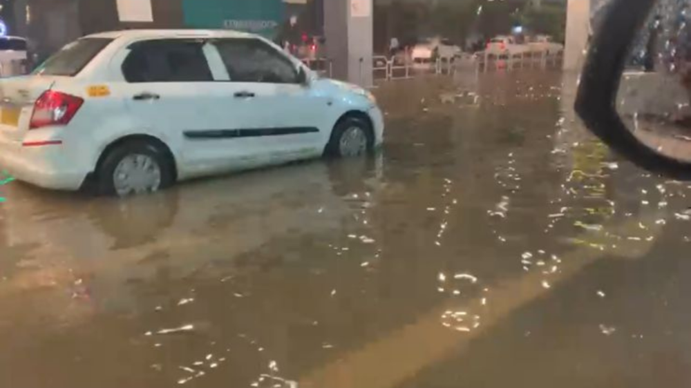 Photos Bengaluru Airport Flooded Flyers Use Tractors The Times Of India