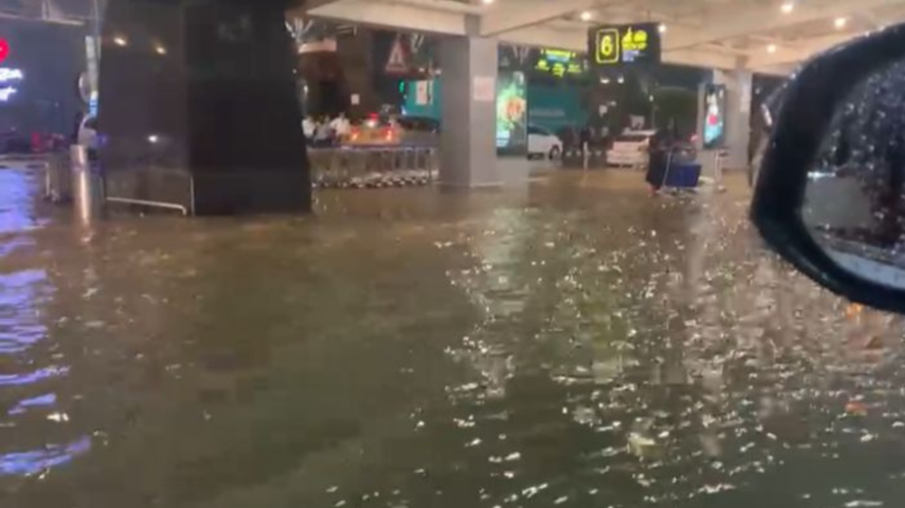 Photos: Bengaluru airport flooded, flyers use tractors | The Times of India