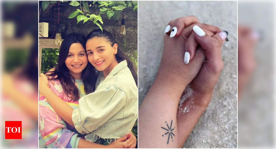 Tiny minimalistic wave tattoo located on Alia Bhatt's