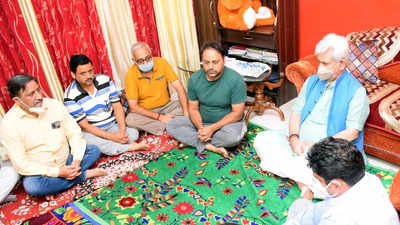 J&K LG Manoj Sinha visits family of slain teacher Deepak Chand, assures all support